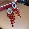Detailed macro close-up of silver stud earrings with sparkling red zircon tassel drops - No. 55 Hollow Teardrop Stepped Tassel Style (55#) / Gold-Red