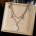 Silver layered stainless steel necklace featuring heart pendants and coin charms - Double Layer Coin Heart Style (N4180)