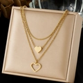 Dreilagige vergoldete Edelstahlkette mit massiven und hohlen Herzanhängern für Damen - Dreischichtiger Doppelherzstil (N4143) / Gold