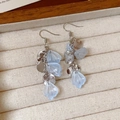 Elegant blue flower glass petal drop earrings with silver hooks on a beige jewelry tray - Silver Needle Style (47#)