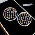 Macro detail view of hollow circular stud earrings with clear zircons on black box - No.67 Vintage Geometric Large Round Disc Style / Gold