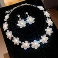 Close-up of elegant rhinestone flower and pearl necklace jewelry set details - Palace Artificial Pearl Floral Style (49#)