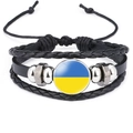 Macro shot of multilayer leather bracelet with adjustable cord and Ukraine flag charm - Ukraine