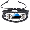 Macro detail of multilayer black leather bracelet with Estonia flag glass charm - Estonia