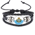 Detail of San Marino flag emblem on multilayered black woven leather bracelet with adjustable cord - 18mm Black / San Marino