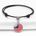 Verstelbare zwarte geweven armband met USA vlag glassteen en zilveren bloemenkraal - Verenigde Staten