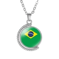 Macro shot of silver moon pendant necklace featuring Brazil flag under a glass dome - Brazil Style (Rotatable)