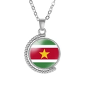 Detailed view of spinning alloy moon pendant with Suriname flag pattern on glass cabochon - Suriname Style (Rotatable)