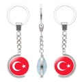 Rotating stainless steel keychain with Turkish flag design and beaded edge detail - Turkey