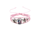 Gros plan du bracelet en cuir tressé rose avec portrait de Washington et drapeau USA - Style Washington Suck it England Rose (HS12056-15)
