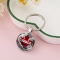 Dettaglio portachiavi bandiera Canada con foglia d'acero su un piatto in ceramica - Stile Classico con Scritta CANADA (CC002398-3)