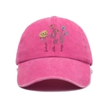 Detailed view of floral prints and embroidered text on a rose red vintage cotton baseball cap - Rose Red