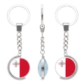Rotating metal keychain featuring double-sided Malta flag gemstone design in silver finish - Malta