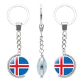 Rotating silver metal keychain featuring a double-sided Iceland flag glass gemstone - Iceland