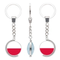 Rotating metal keychain featuring double-sided Poland flag pattern with glass dome finish - Poland Landmark