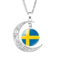 Silver crescent moon necklace featuring a Swedish flag glass cabochon pendant - Sweden