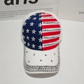 Detail of American flag baseball cap featuring handmade sparkling rhinestones on the brim - Adjustable / White