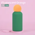 350ml sea green stainless steel water bottle with vibrant orange cap on pink background - Algae Green Body with Neon Orange Ball Lid