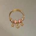Bracciale multistrato dorato con ciondoli stella e luna, perle rosa e cristalli lucenti - Bracciale Oro Rosa Stella e Luna