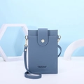 Detailed view of sky blue lychee grain faux leather phone bag with gold metal buckle - Blue