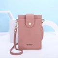 Detail of pink lychee leather phone bag with gold hardware and snap closure detail - Pink