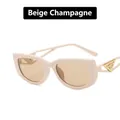 Creamy champagne cat eye sunglasses with golden triangle metal trim and tinted lenses - Beige Frame Champagne Lens