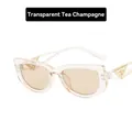 Cat eye sunglasses in transparent tea champagne with gold triangle detail - Transparent Tea Champagne Lens