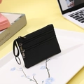 Porte-monnaie noir en toile à plusieurs poches, trois zips et crochet anneau métallique - Noir