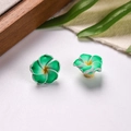 Dettaglio di fiori di plumeria verdi da 16mm in pasta polimerica per gioielli fai da te - Verde
