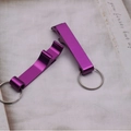 Pair of purple aluminum bottle opener keychains with a sleek matte metallic finish - Purple (11g)