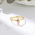 Elegante anillo de acero titanio dorado con circonita blanca y colgante de gota rosa - US 7 / Dorado/Rosa