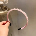 Detailed close-up of pink beaded headband with secure black fabric lining and handmade finish - Pink Crystal