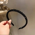 Detailed view of handmade black beaded crystal headband with soft inner velvet lining - Black Crystal