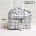 Silver quilted toiletry bag with metallic finish and top handle for travel storage - Silver Bucket Bag