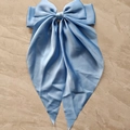 Elegant light blue satin bow hair clip with long ribbons and silky glossy finish - Lake Blue
