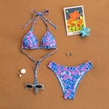 Blue floral bikini set with halter top and high cut bottoms on a sandy background - XS / Blue Purple Floral