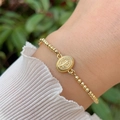 Classic 18K gold plated beaded bracelet with religious oval medallion for daily wear - Religious Icon Relief Medal Style