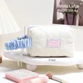 Quilted cream cosmetic bag with blue ruched handle and 3D heart pattern embroidery - Large / Beige