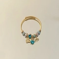 Pulsera de hilo dorado con colgante de corazón azul y amuleto de oso pavé - Azul