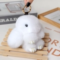 Plush white rabbit charm with golden ring and soft faux fur texture for bags - Large / White