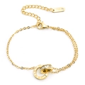 Detail of gold double-layer stainless steel necklace with Roman numerals and zircon stones - Bracelet / Gold