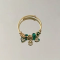 Golden multi-strand bangle featuring green heart pendant and sparkling beaded charms - Evil Eye Tag Style (B1189-8)