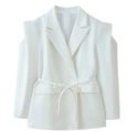 Detail of white blazer featuring padded shoulders, lapel collar, and matching waist belt - White