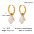Detailed macro view of gold star charms and white freshwater pearls on steel earrings - Gold Octagram Star Pearl Pendant Style (YYE023097)