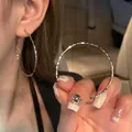 Elegant s925 silver large hoop earrings with textured finish and shimmering metal luster - 5cm Hoop Earrings - E6052 Silver