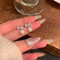 Silver bow pearl earrings featuring micro-pasted zircons and elegant white pearls - Exquisite Zircon Bow Earrings - A1405 Silver
