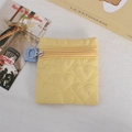 Quilted heart coin purse in bright yellow featuring a sky blue lanyard and silver ring - Yellow