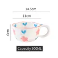 Irregular wave edge ceramic mug with hand-painted pink flowers and blue hearts, 300ml capacity - Wavy Edge Mug / Heart Flower