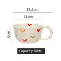 Hand-painted ceramic wave mug with colorful hearts and a large round handle, 300ml capacity - Wavy Edge Mug / Multi-colored Hearts