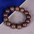 Handcrafted brown Liu Dao Mu wood prayer beads with 12 round beads and natural patterns - Premium Old Wood 18mm*13 Beads (Classic Style)